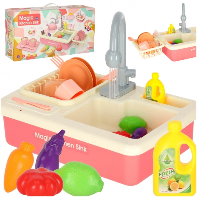 Kinderkeuken gootsteen met echt water en roze accessoires