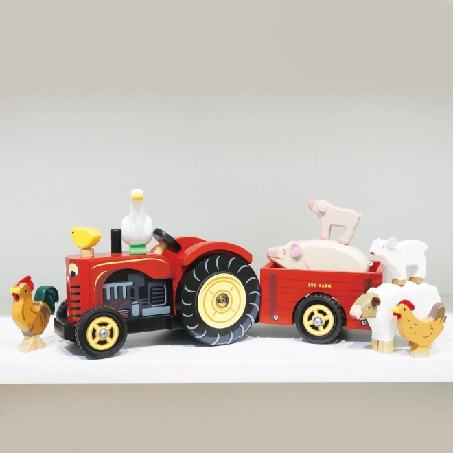 Le Toy Van roter Traktor mit Anhänger