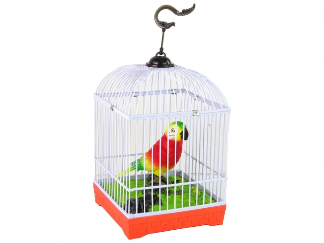 Zingende kleurrijke papegaai met kooi