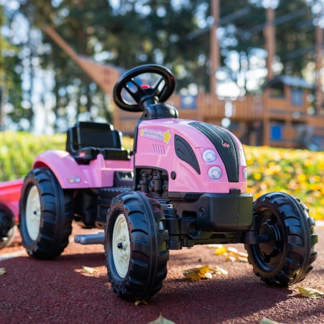 Tractor trapauto County Star met roze aanhangwagen