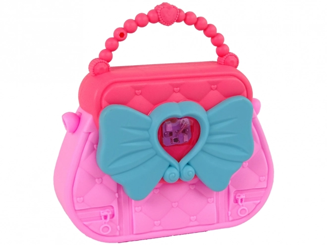 Schoonheid set met slofjes, handtas en roze haarspeldjes