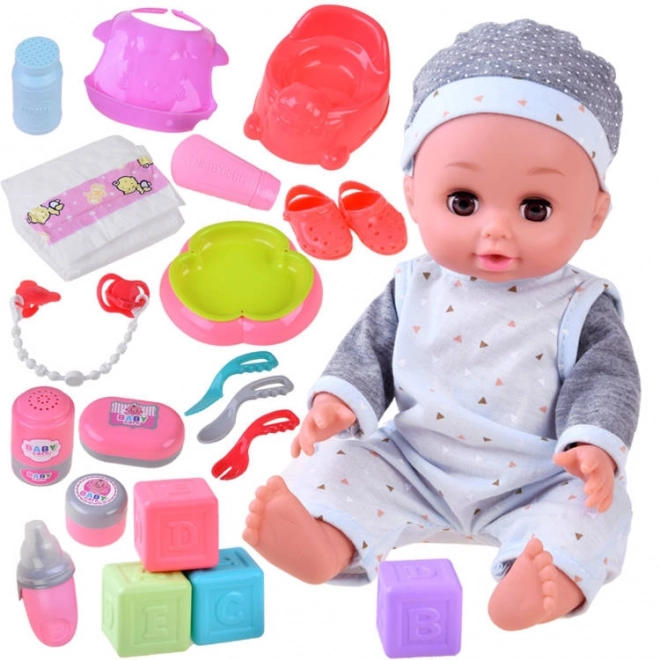 Interactieve pop baby drinkt plast en praat