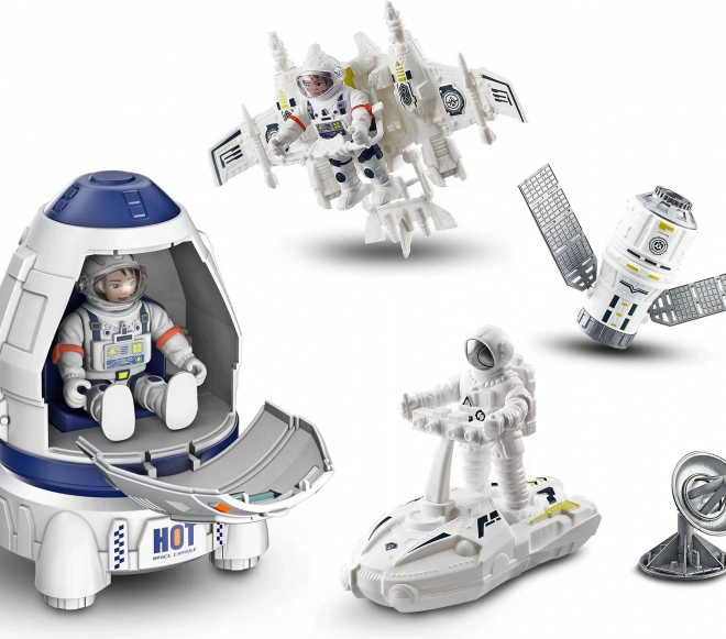 Ruimteset met raket en 2 astronautenfiguren