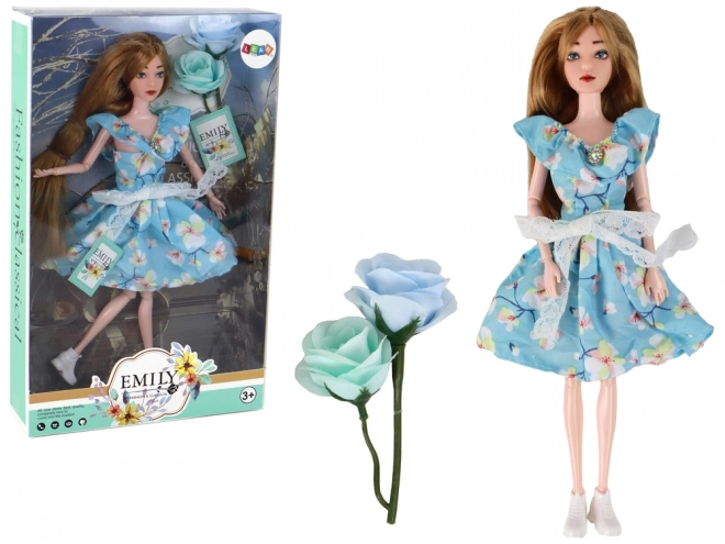Emily Baby Pop Lente lang haar Blauw Jurkje Bloem