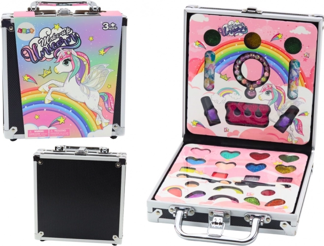 Coffret cosmétique dans une petite valise avec fards à paupières, paillettes et vernis – noir