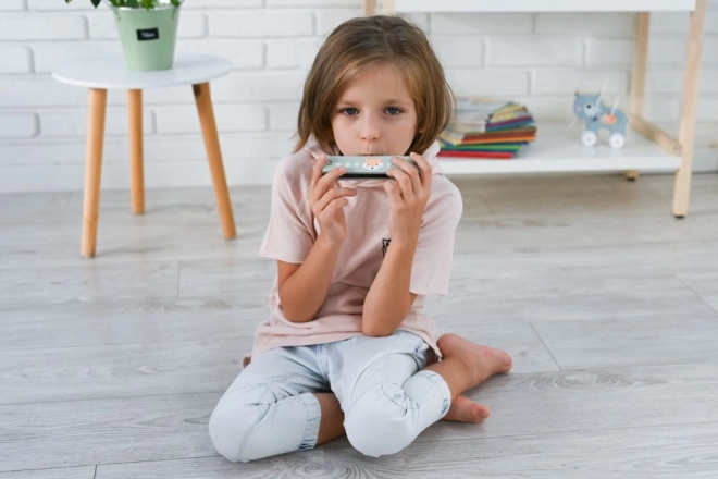 Harmonica vert avec motif de renard
