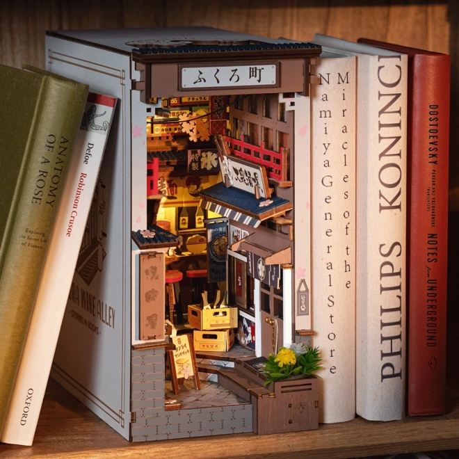 3D puzzel boekensteun Sakuralaan met wijn
