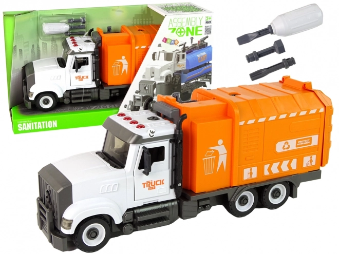 Oranje afvalwagen met schroef- en draaibare accessoirekit