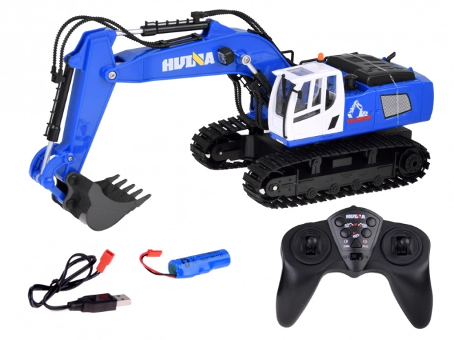 Op afstand bestuurbare blauwe graafmachine op rupsbanden