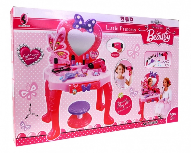 Roze kaptafel met spiegel en stoeltje + stylingaccessoires en föhn