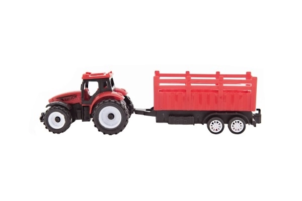 Tractor met aanhanger van plastic 21cm vrij lopend 2 kleuren in doosje 23x9x6cm