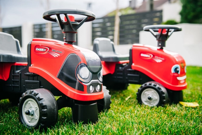 Rijtractor Baby Case IH rood met aanhanger