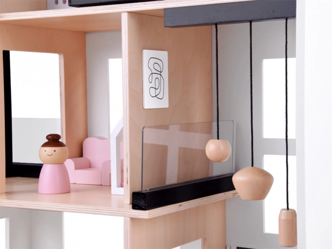 Houten poppenhuis in loftstijl