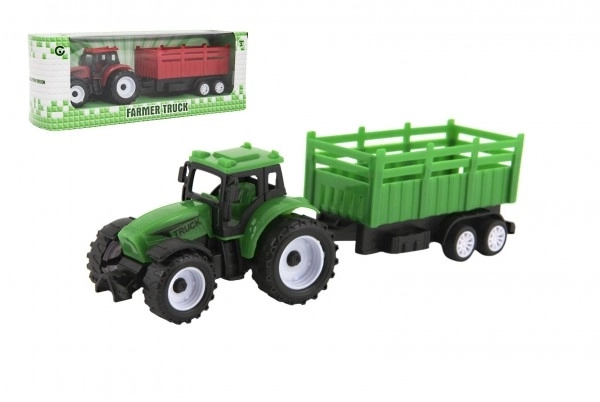 Tractor met aanhanger van plastic 21cm vrij lopend 2 kleuren in doosje 23x9x6cm