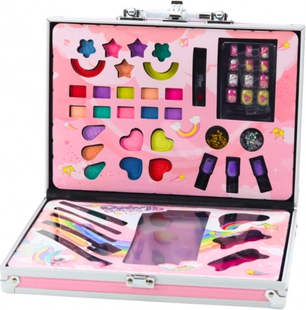 Children's pink makeup set in a case with nail polishes, eyeshadows and brushes