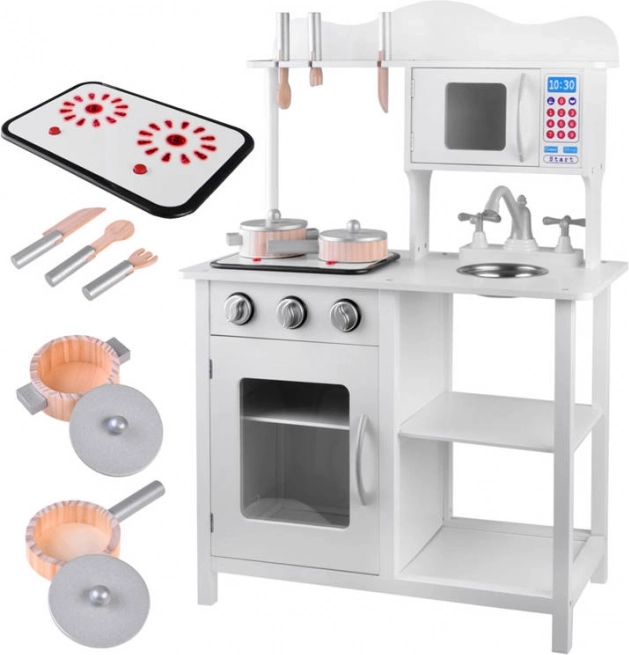 Interactive white wooden kids’ play kitchen with induction hob and accessories