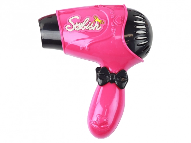 Stilvoller rosa Kinderkoffer mit Kosmetikzubehör