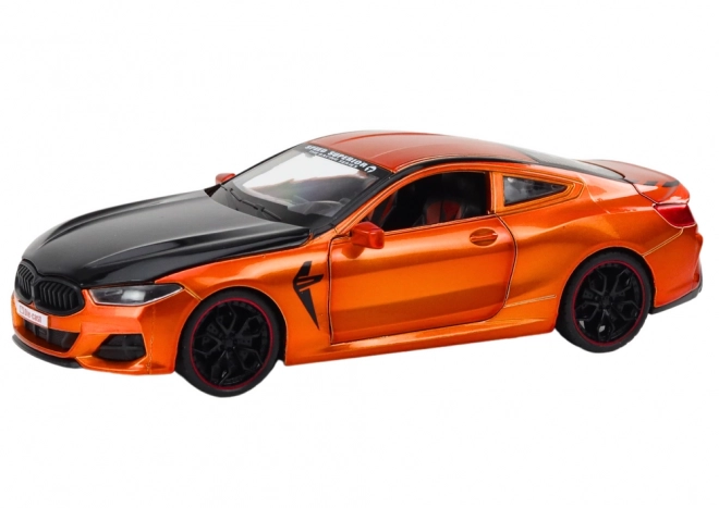 Metal sports model with friction drive and opening features 1:24 orange