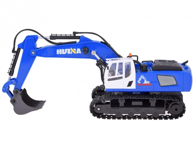 Op afstand bestuurbare blauwe graafmachine op rupsbanden