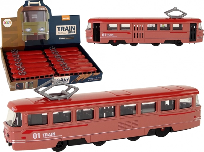 Roter Metallzug mit Reibungsantrieb und Geräuschen