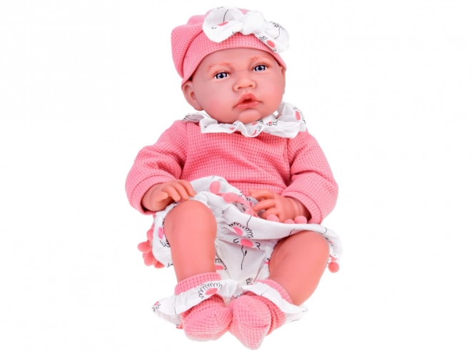 Interactieve pop van 45 cm in roze outfit