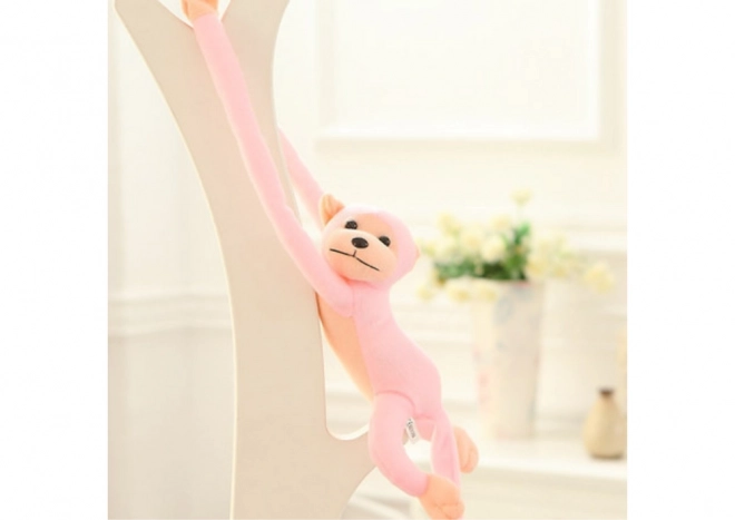 Roze pluchen aap mascotte met geluid 60 cm