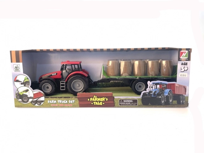 Traktor mit Schwungrad und Anhänger voller Heu