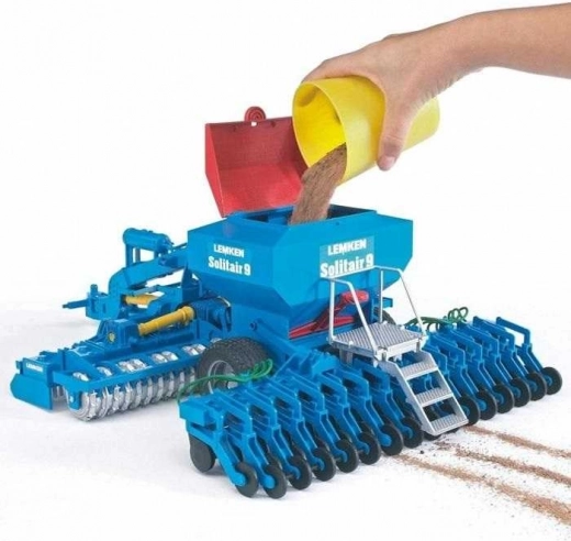 Fillable seed hopper with easy emptying