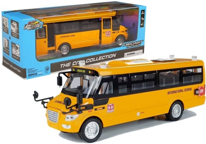 Metalen schoolbus met opwindmotor