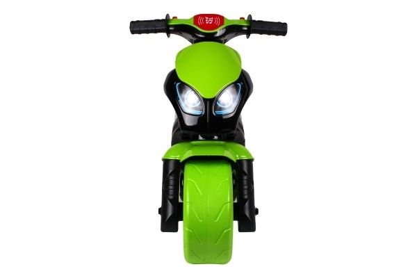 Loopfiets motor groen-zwart plastic op batterij met licht en geluid in zak 36x53x74cm