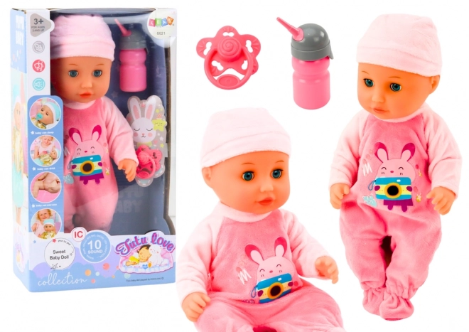 Baby-Puppe mit rosa Kleidung und Soundeffekten