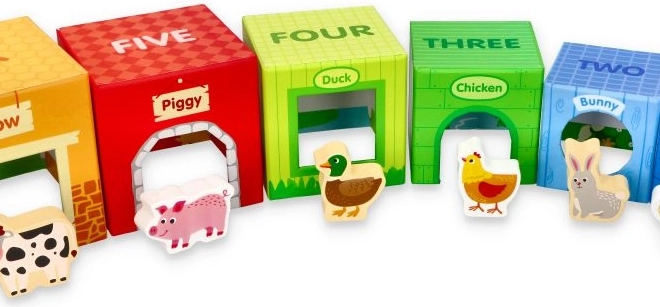 stacking blocks with farm animals