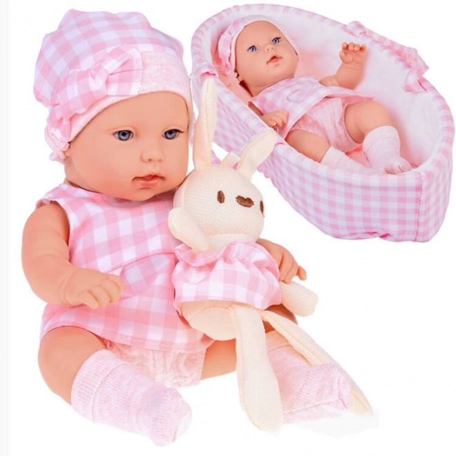 Stoffen paspop pasgeborene met roze muts