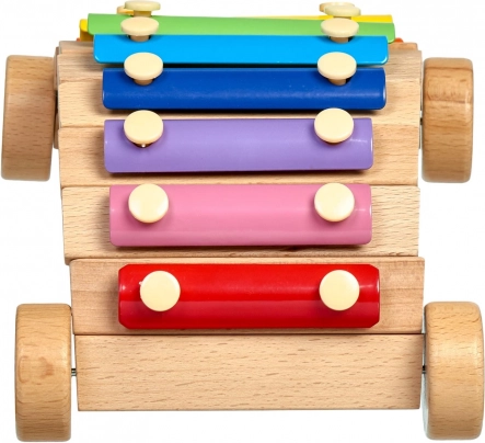Jouet roulant et instrument en un