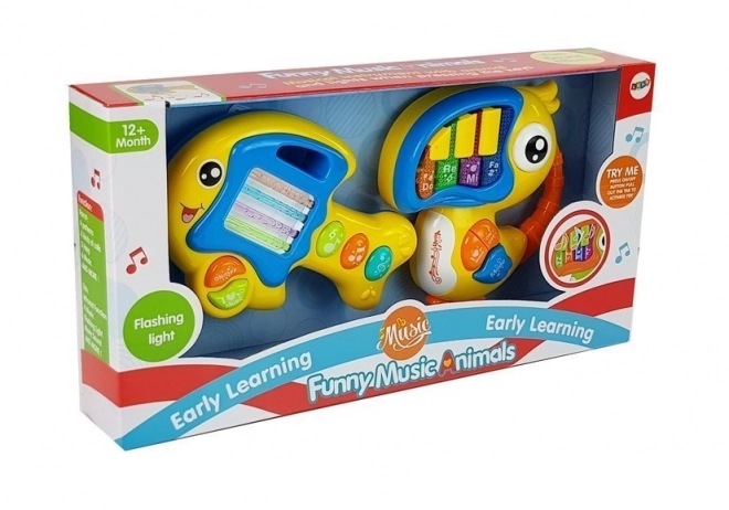 Interaktives Spielzeug Klavier und Gitarre Papagei und Fisch