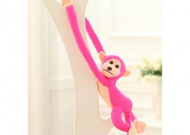 Pluchen mascotte aap met geluid donkerroze 60 cm