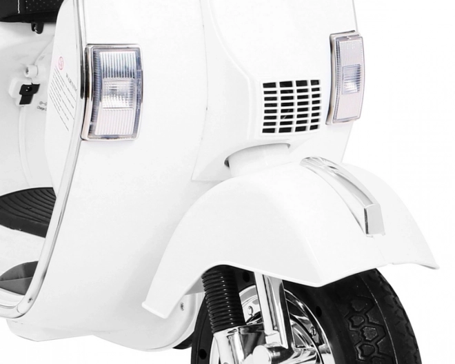 Elektrische kinderscooter Vespa wit met zijwieltjes, audio en eco-leer
