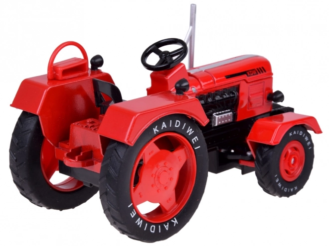 Rode metalen tractor met rubberen wielen 1:18