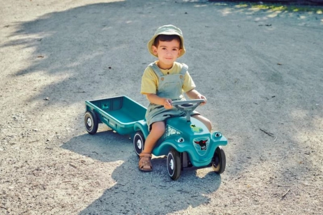 Auto duwwagen met aanhangwagen in turquoise kleur
