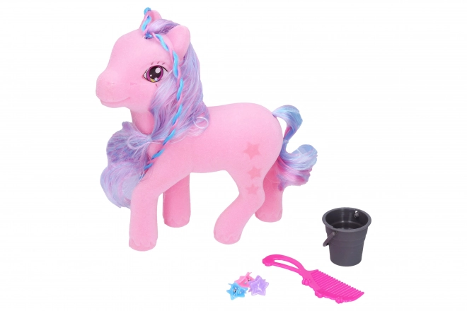 Pony met vlechtstaarten om te stylen
