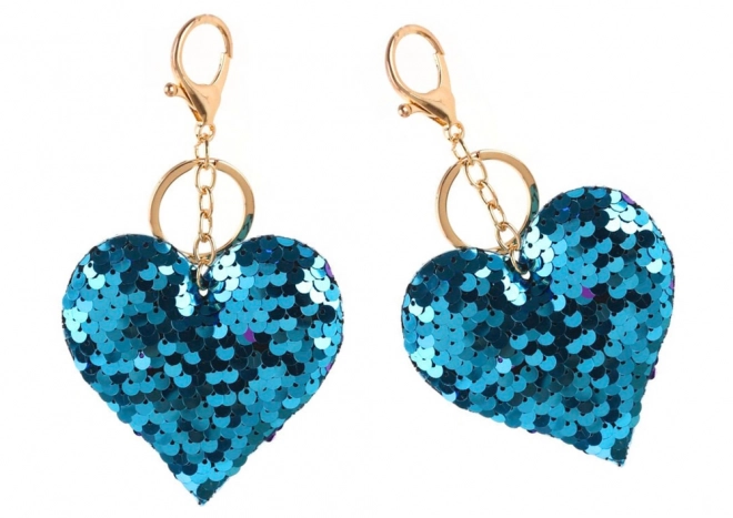 Sleutelhanger in de vorm van een hart met dubbelzijdige glitters - zilver en blauw