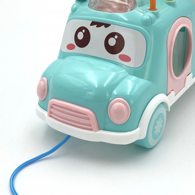 Voiture musicale avec trieur et xylophone vert Woopie