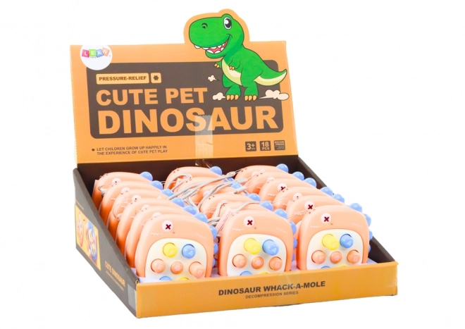 Interactief spel Whack A Mole met letters oranje dinosaurus