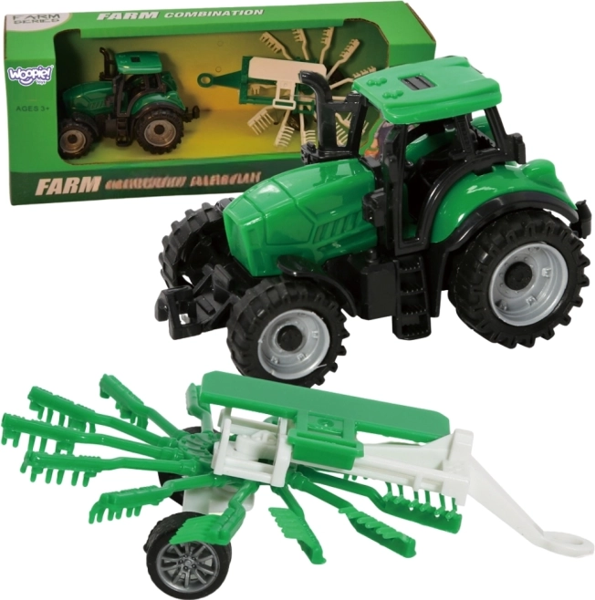 Tractor met Grijper Woopie