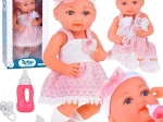 Rubber doll in pink dress with pacifier ZA5235