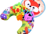 Stabilizing baby pillow with rattles and crinkly mat
