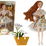 Emily doll in floral dress with autumn accessory