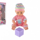 Baby doll 25 cm with solid body and block in a box