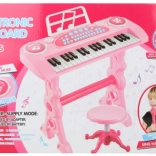 Roze kinderpiano met adapter