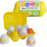 TOMY cheerful squeaky eggs – shape sorter in a yellow box